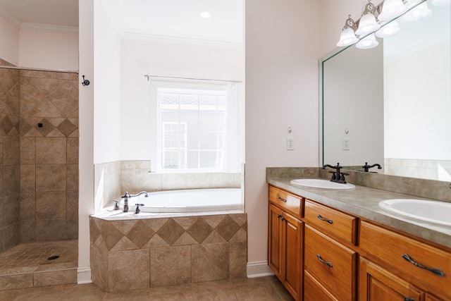 bathroom with crown molding, tile patterned floors, a sink, and double vanity