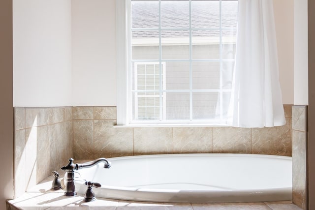 full bathroom featuring a garden tub