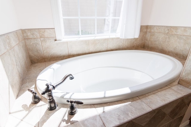 full bath featuring a garden tub