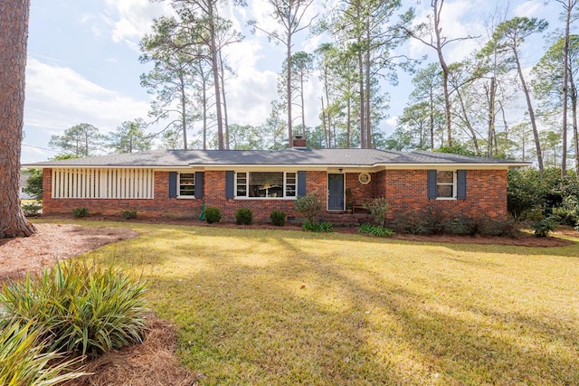 ranch-style house with brick siding, crawl space, and a front yard