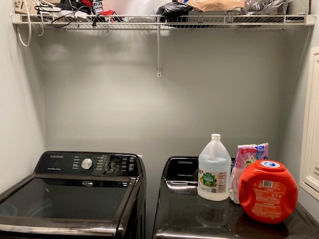 laundry room with washer and clothes dryer