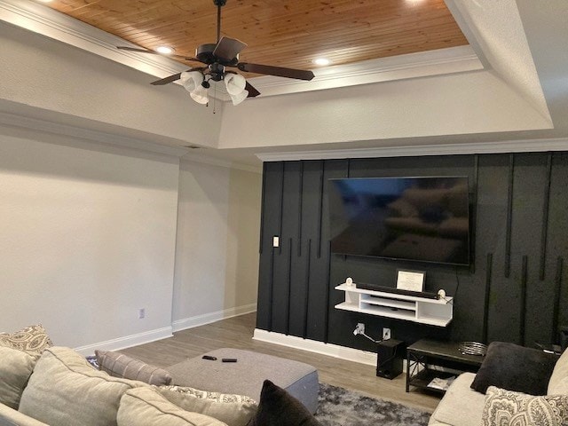 living room with hardwood / wood-style flooring, wood ceiling, and a tray ceiling