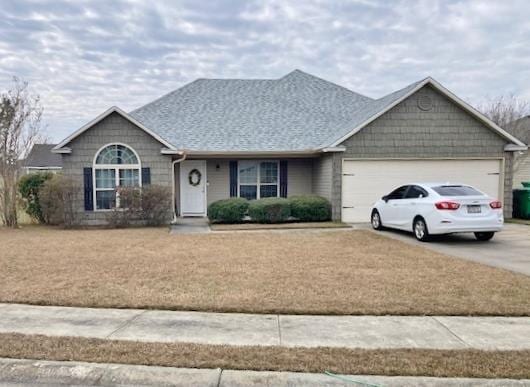 single story home featuring a garage