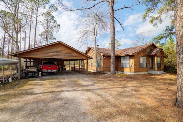 view of front facade featuring a carport