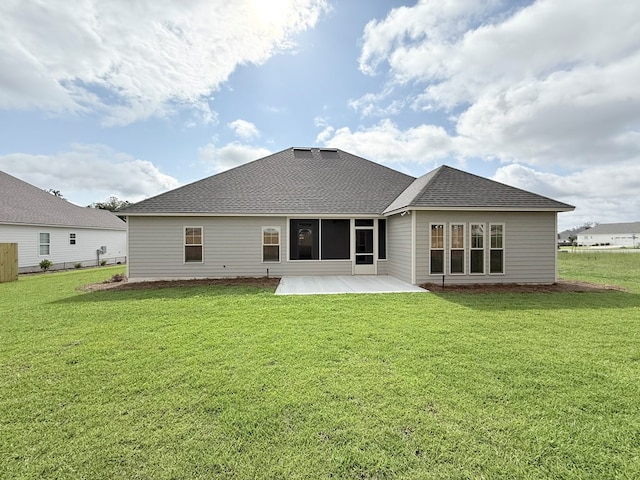 4965 Hatfield Cir, Hahira, GA 31632 - rear view of house with a patio area, a yard, and a shingled roof