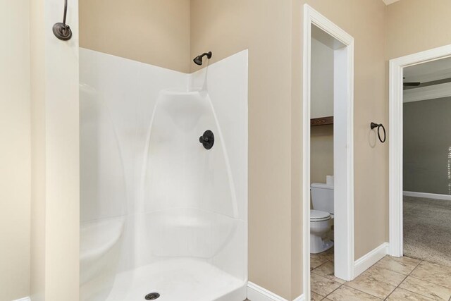 5527 School House Pond Rd, Lake Park, GA 31636 - full bathroom featuring a shower, toilet, and baseboards