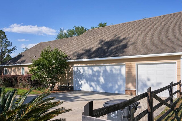 5527 School House Pond Rd, Lake Park, GA 31636 - garage with driveway and fence