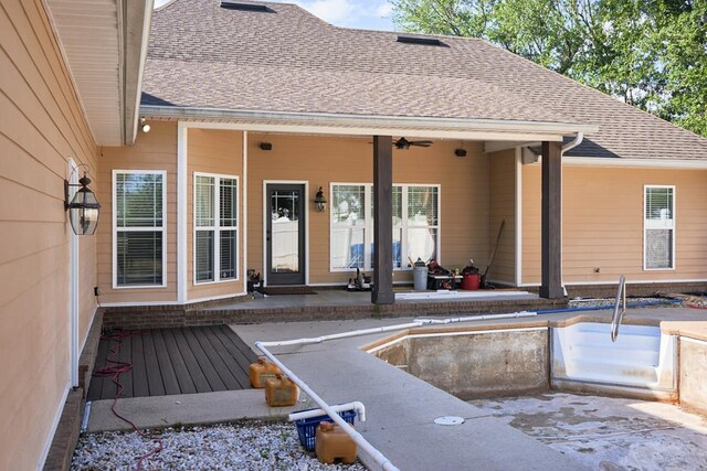 5527 School House Pond Rd, Lake Park, GA 31636 - rear view of property featuring a ceiling fan, a patio area, and roof with shingles