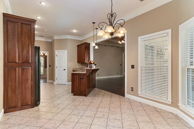 5527 School House Pond Rd, Lake Park, GA 31636 - kitchen with crown molding, a chandelier, light tile patterned floors, baseboards, and recessed lighting