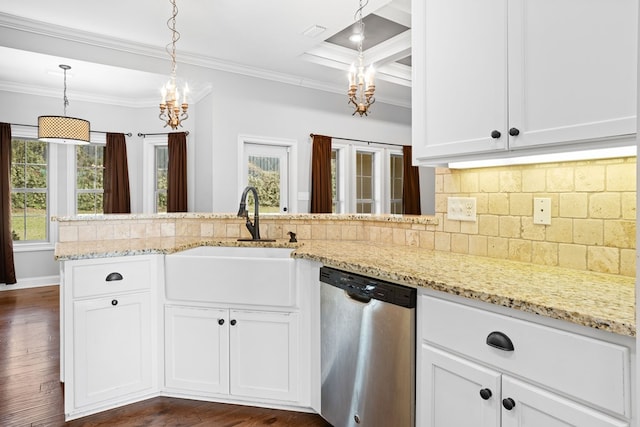 kitchen featuring light stone counters, a sink, stainless steel dishwasher, tasteful backsplash, and crown molding