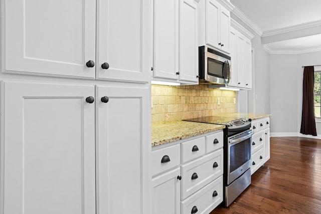 kitchen with light stone counters, dark wood-style floors, stainless steel appliances, decorative backsplash, and ornamental molding