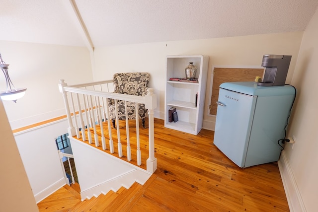 7552 Webb Rd, Hahira, GA 31632 - stairs featuring wood-type flooring and baseboards