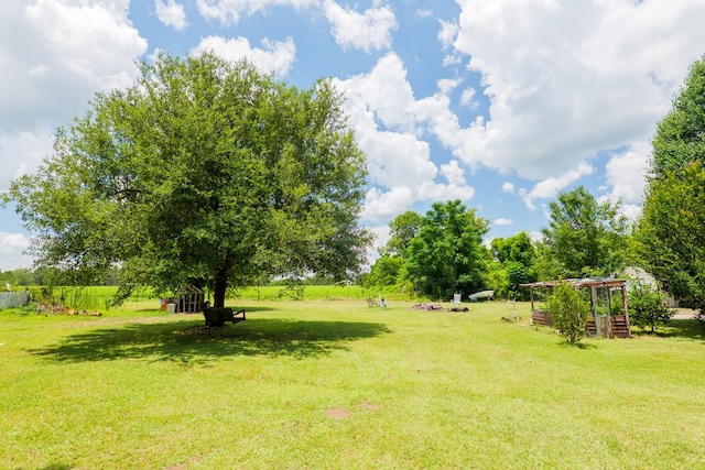 7552 Webb Rd, Hahira, GA 31632 - view of green lawn with an outbuilding