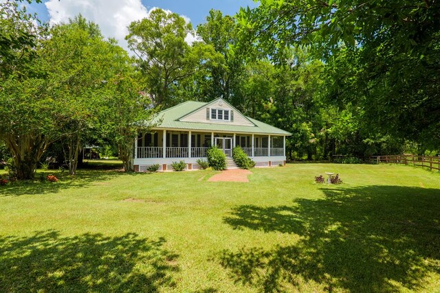 7552 Webb Rd, Hahira, GA 31632 - rear view of house with a sunroom