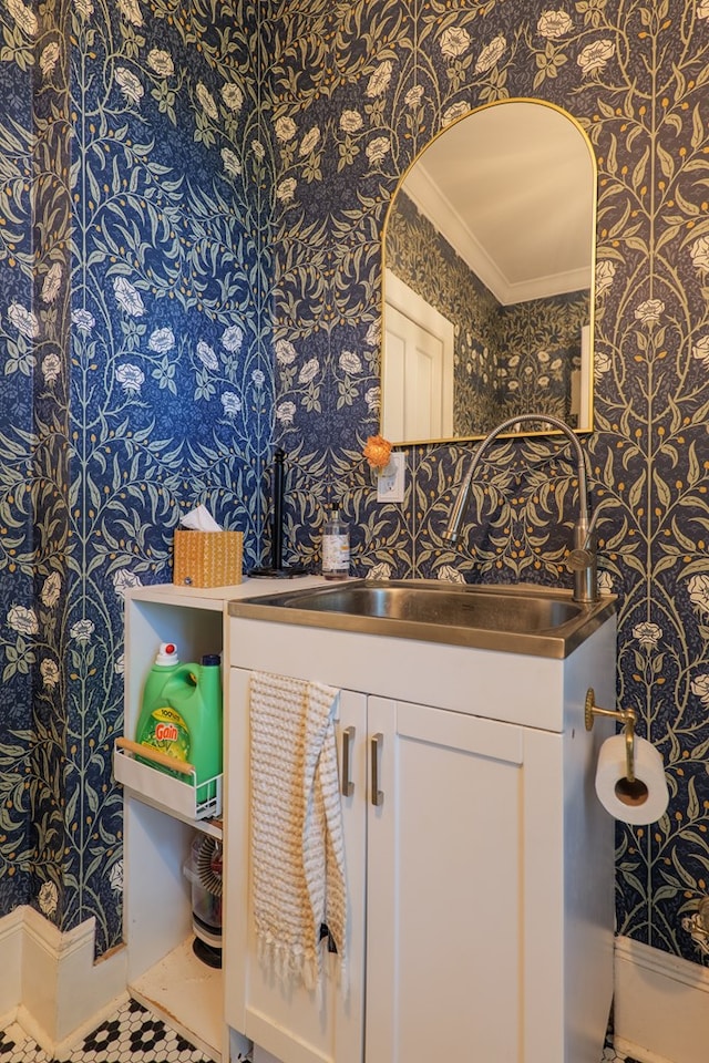 7552 Webb Rd, Hahira, GA 31632 - bathroom featuring wallpapered walls, ornamental molding, and vanity