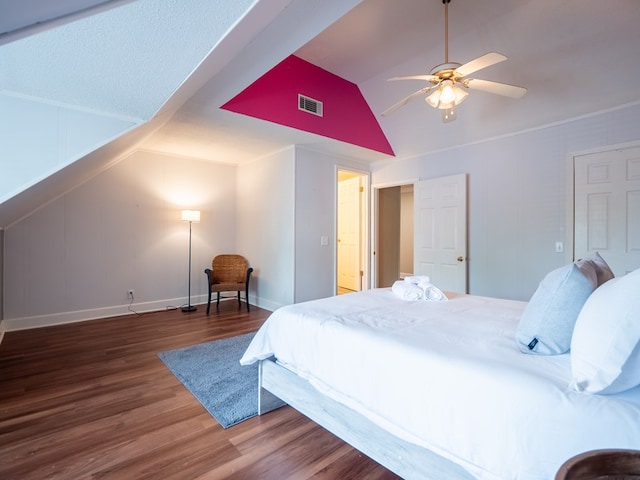 103 W Moore St, Valdosta, GA 31602 - bedroom with wood finished floors, vaulted ceiling, baseboards, and a ceiling fan