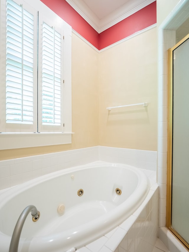 103 W Moore St, Valdosta, GA 31602 - bathroom featuring a shower stall, a jetted tub, and ornamental molding