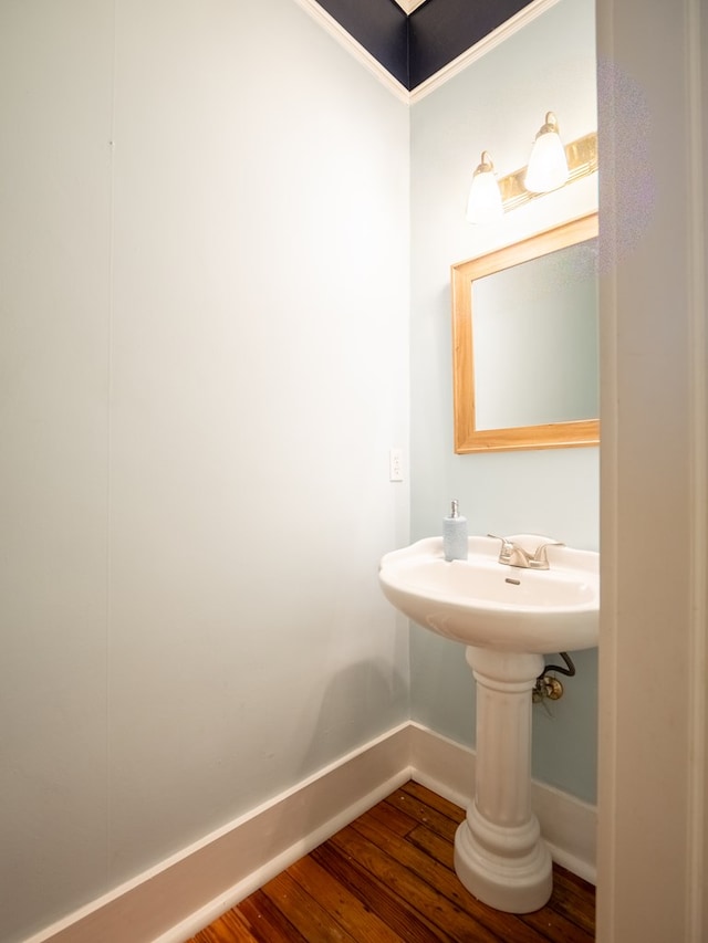 103 W Moore St, Valdosta, GA 31602 - bathroom featuring baseboards and wood finished floors