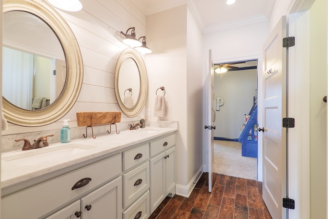 7351 Woodbend Trl, Hahira, GA 31632 - full bathroom with ornamental molding, double vanity, and wood finished floors