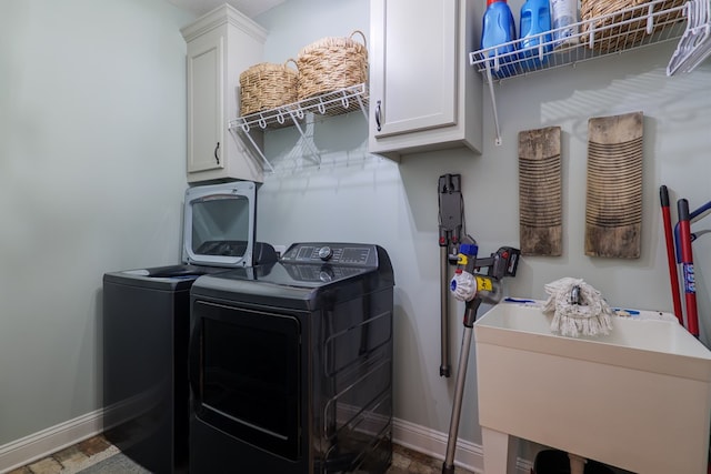 7351 Woodbend Trl, Hahira, GA 31632 - laundry room featuring cabinet space and washing machine and clothes dryer