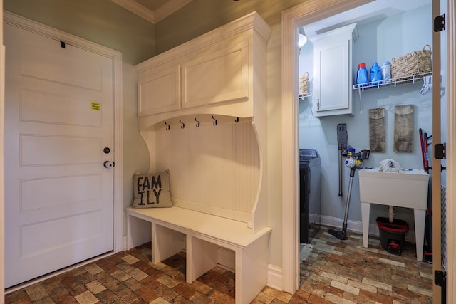 7351 Woodbend Trl, Hahira, GA 31632 - mudroom featuring brick flooring, crown molding, and washer / clothes dryer
