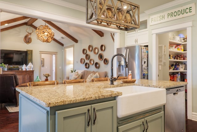 7351 Woodbend Trl, Hahira, GA 31632 - kitchen featuring appliances with stainless steel finishes, open floor plan, crown molding, dark wood-style floors, and light stone counters