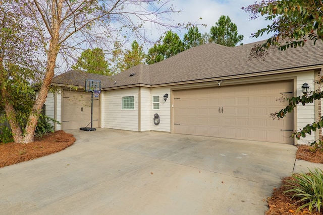 7351 Woodbend Trl, Hahira, GA 31632 - view of front facade featuring concrete driveway, an attached garage, and a shingled roof