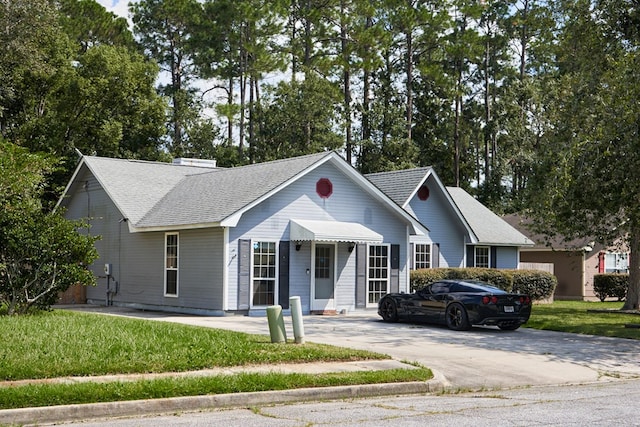 ranch-style house with a front yard