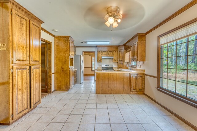 kitchen with stainless steel refrigerator with ice dispenser, butcher block countertops, ornamental molding, and light tile patterned flooring