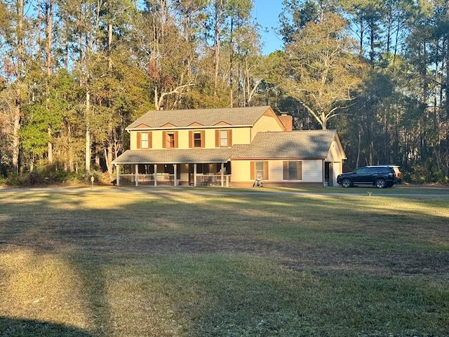 farmhouse-style home featuring a front yard and a porch