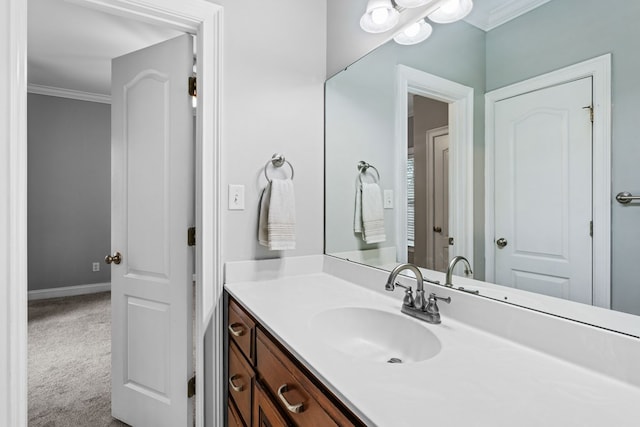 bathroom featuring vanity and ornamental molding