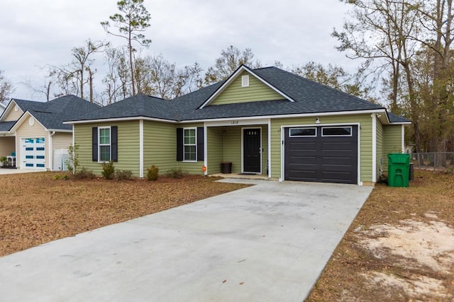 ranch-style house featuring a garage