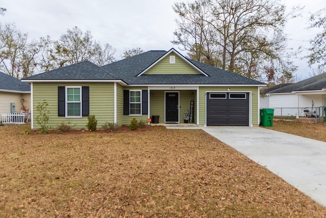 single story home featuring a garage