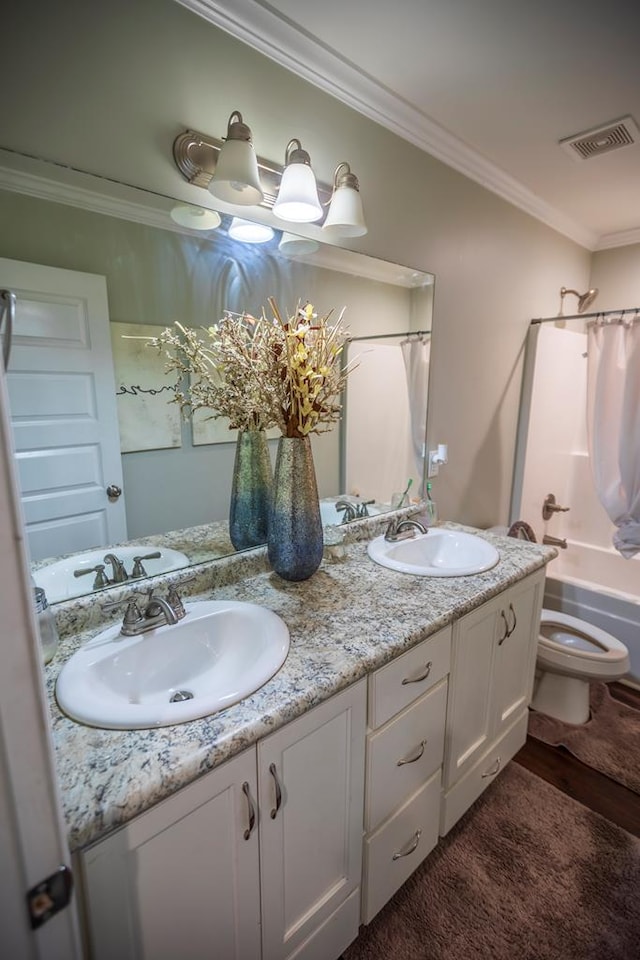 full bathroom with toilet, shower / tub combo with curtain, vanity, and ornamental molding