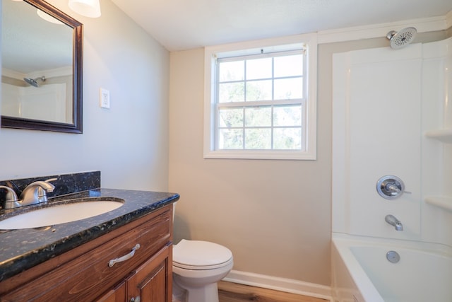 full bathroom featuring toilet, vanity, bathtub / shower combination, and hardwood / wood-style flooring