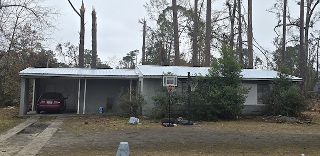 view of front of house featuring a carport