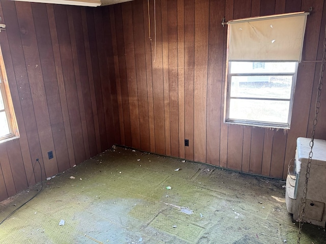 empty room with wood walls