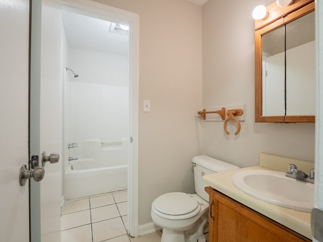 full bathroom with tile patterned floors, a textured ceiling, toilet, vanity, and shower / bathtub combination