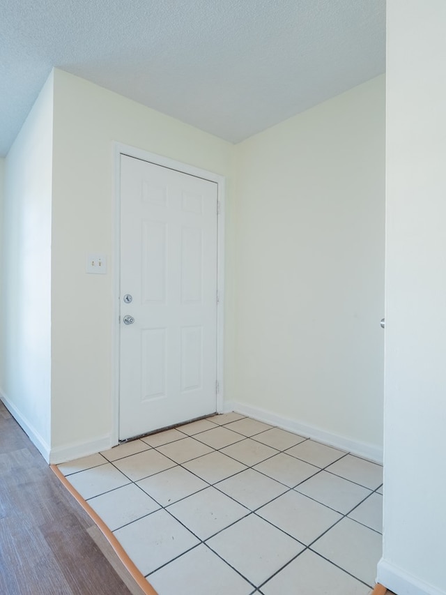 interior space featuring a textured ceiling