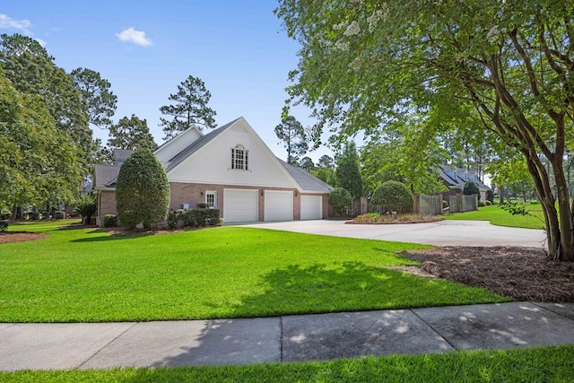 4155 Quail Run Cir, Valdosta, GA 31601 - view of front facade with driveway and an attached garage