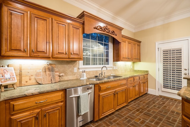 kitchen with light stone countertops, a sink, decorative backsplash, dishwasher, and crown molding