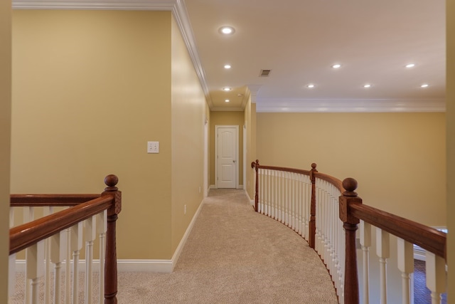 hallway with light carpet, recessed lighting, baseboards, and an upstairs landing