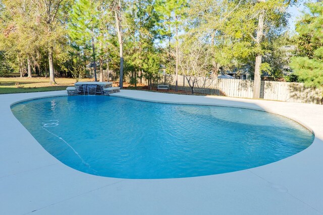 view of swimming pool with a fenced backyard and a fenced in pool