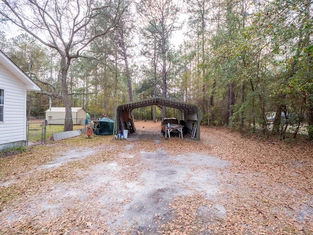 view of parking / parking lot with a carport