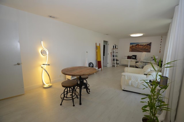 living room featuring light hardwood / wood-style flooring