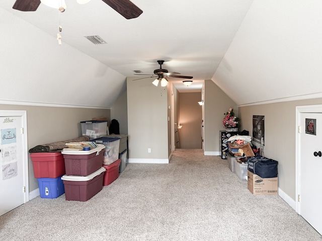 bonus room featuring carpet, vaulted ceiling, visible vents, and ceiling fan