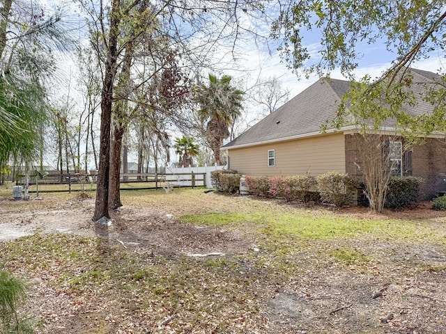 view of yard with fence