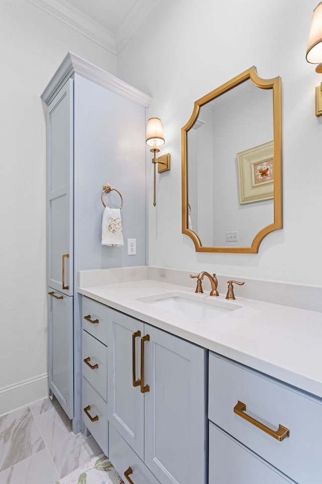 bathroom featuring vanity, marble finish floor, and ornamental molding