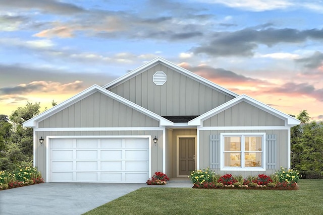 view of front of house featuring a yard, a shingled roof, concrete driveway, an attached garage, and board and batten siding