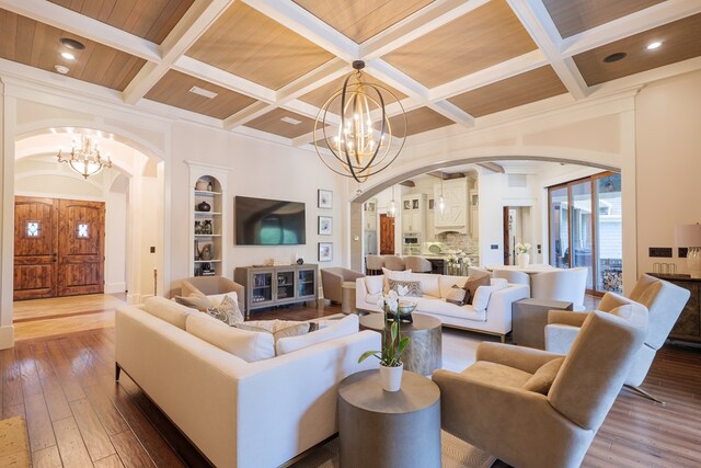 living room with hardwood / wood-style floors, wooden ceiling, coffered ceiling, and a notable chandelier